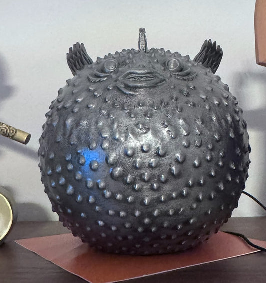 Mondegreen Puffer Statue